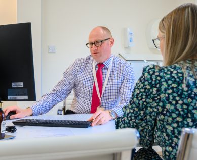 Consultant in discussion with a patient
