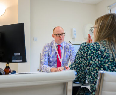 Consultant in discussion with a patient
